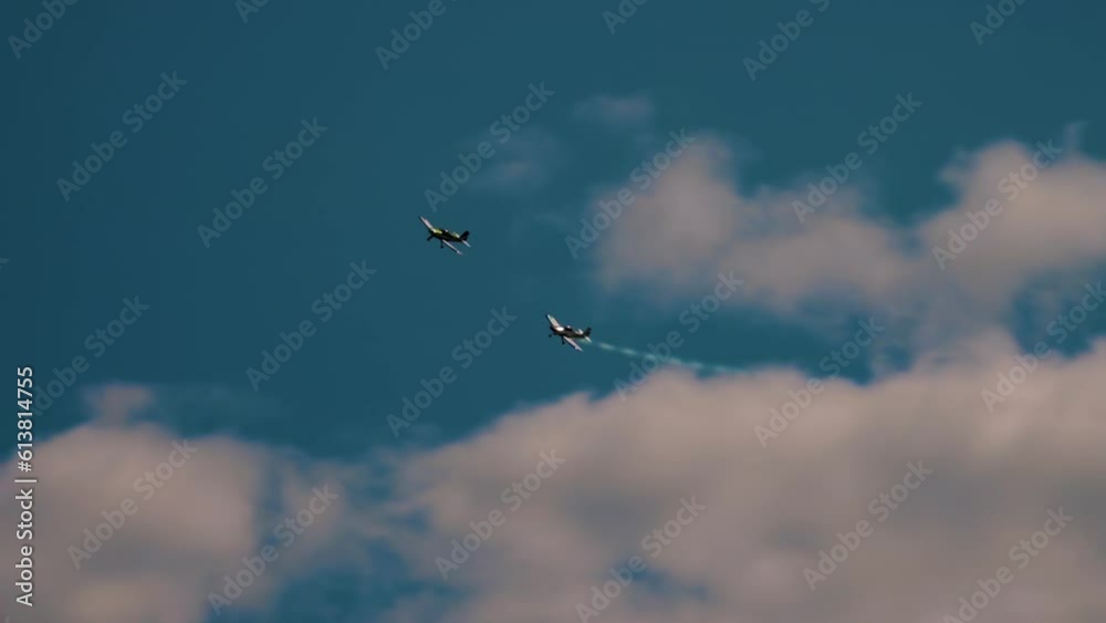 Private plane crash. A small plane during an aerobatic simulation. Airplane engine failure, white smoke coming out of the engine as the plane crashes. Aircraft engine failure. Airplane accidents. Private plane crash. A small plane during an aerobatic simulation. Airplane engine failure, white smoke coming out of the engine as the plane crashes. Aircraft engine failure. Airplane accidents.