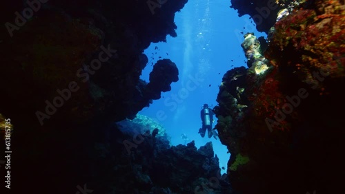 Wallpaper Mural Underwater Cave with Diver. Tropical blue sea water. Scuba Diver Exploring Cave. Slow Motion. Red Sea, Egypt. Underwater World Life. Tropical Underwater Seascape. Reef Coral Scene. Torontodigital.ca