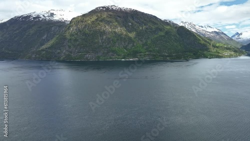 Ferry connection Eidsdal to Linge for travellers to Geiranger in Norway - Aerial flying above fjord looking towards Linge ferry pier photo