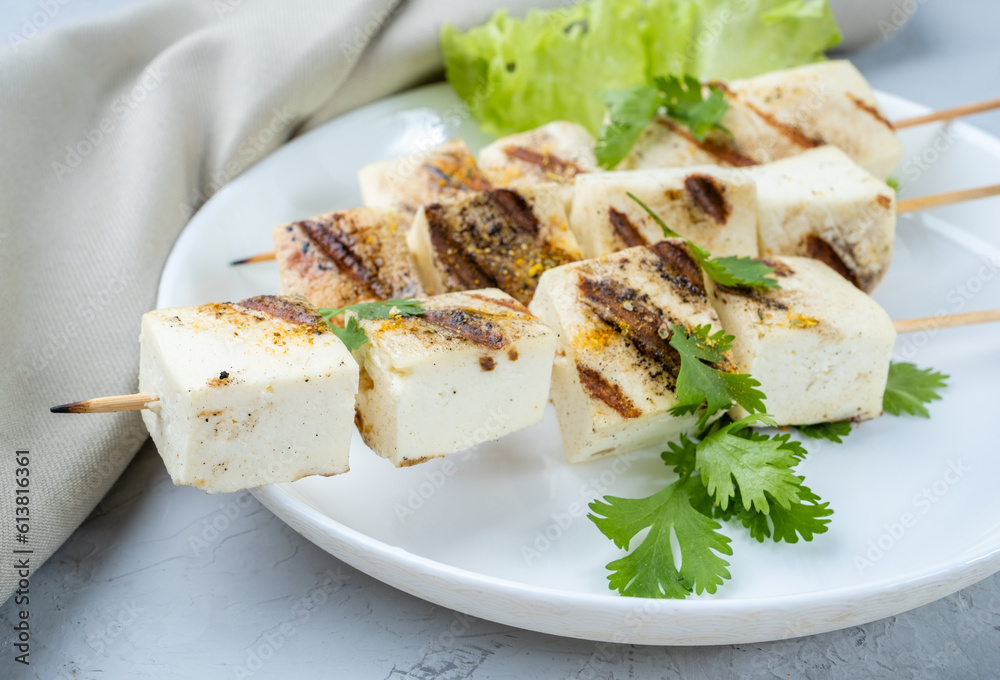 Skewers with slices of grilled cheese close-up, Barbecue cheese, skewers of paneer cheese. Skewers with slices of grilled cheese close-up, Barbecue cheese, skewers of paneer cheese.