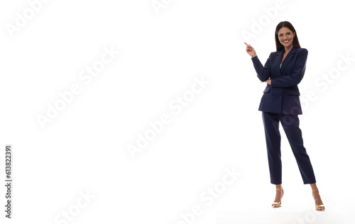 Beautiful woman in an elegant suit on a white background in a photo studio.