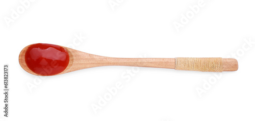 Wooden spoon with tasty ketchup isolated on white, top view