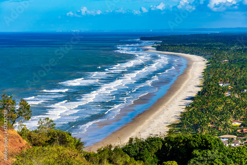 Fototapeta Naklejka Na Ścianę i Meble -  Panoramic top view of the beaches of Sargi and Pe de Serra with their coconut trees in Serra Grande on the south coast of the state of Bahia