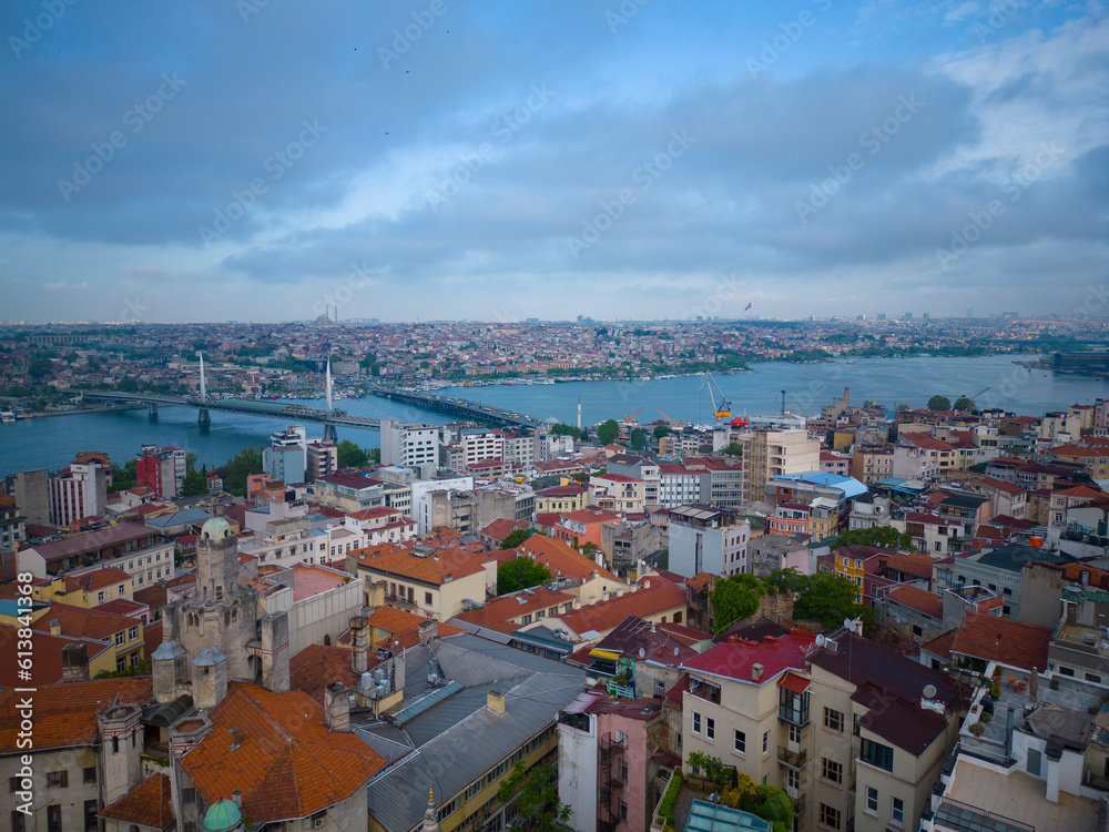 Golden Horn Bridge and Ataturk Bridge over Golden Horn and Beyoglu historic district aerial view in morning twilight in historic Istanbul, Turkey. Historic Areas of Istanbul is a World Heritage Site. 