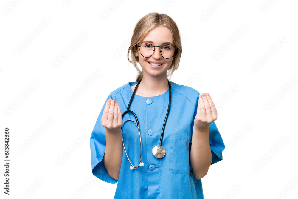 Young nurse English woman over isolated background making money gesture Young nurse English woman over isolated background making money gesture