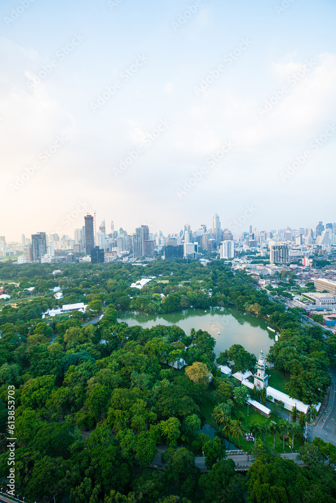 Aerial view Bangkok city Lumpini public park with office building urban background