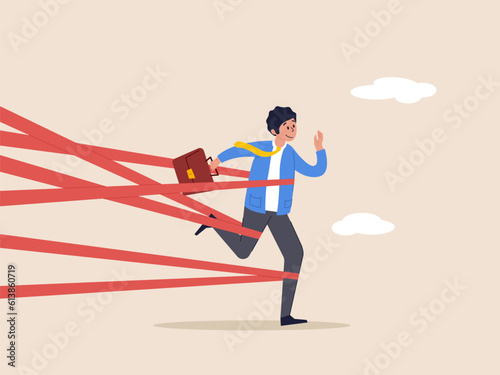Challenge to overcome to success concept. Business difficulty or struggle with career obstacle, limitation and trap, businessman tied up with red tape trying to run away with full effort.