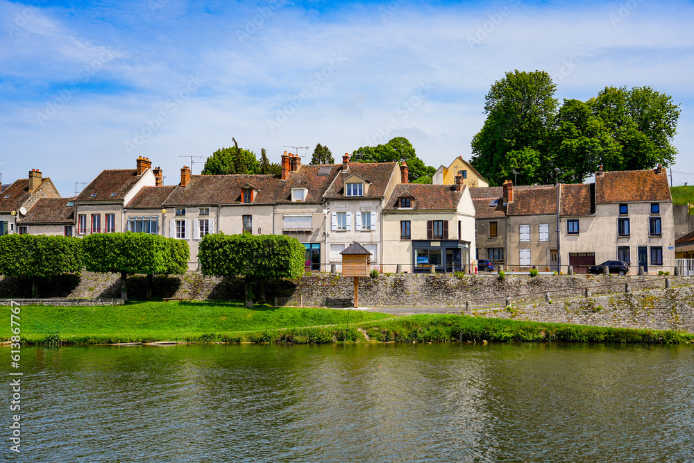 Obraz premium Houses on the banks of the Loing river in Nemours, a small town in the south of the Seine et Marne department in Paris region, France