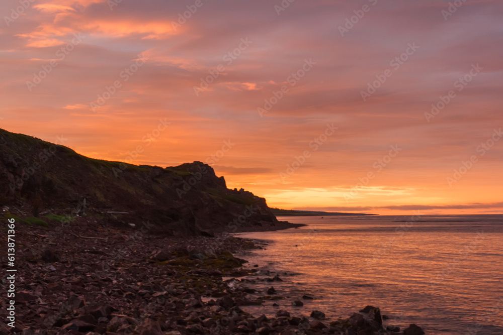 Sunset on the White Sea coast near Cape Ship. Amethyst coast.