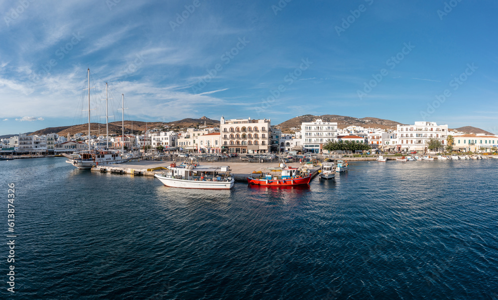 Greece Tinos island Hora Cyclades. View from ship of building cafe port sea blue sky summer vacation