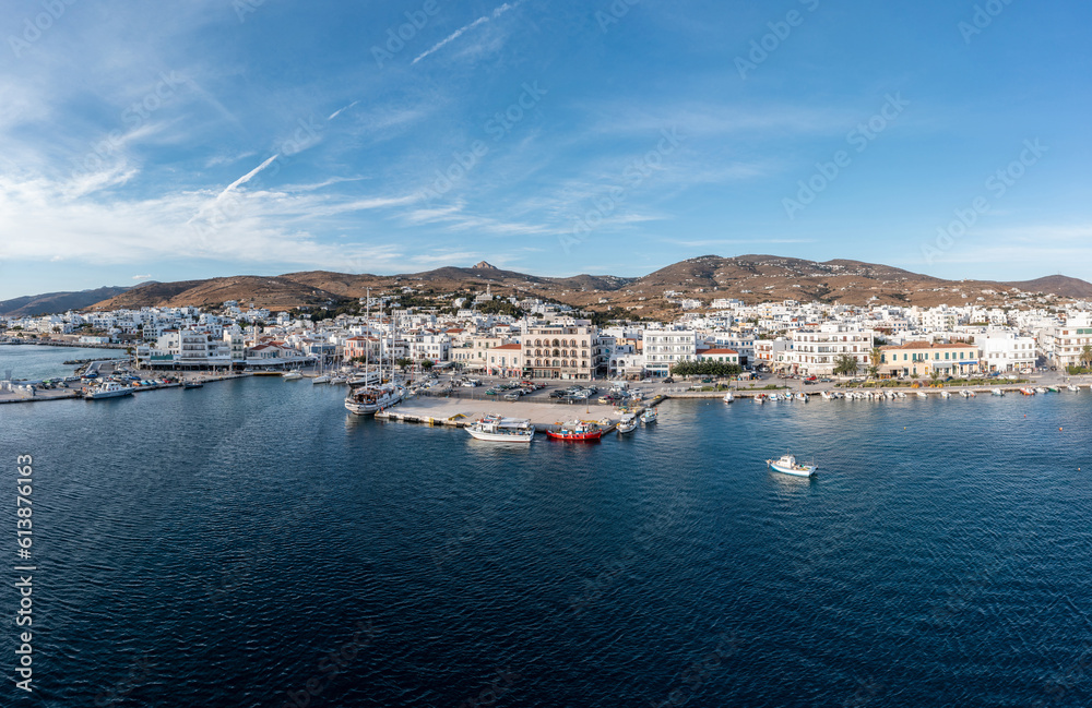 Tinos island Hora town Greece Cyclades. Aerial drone view of port Aegean sea, summer vacation.