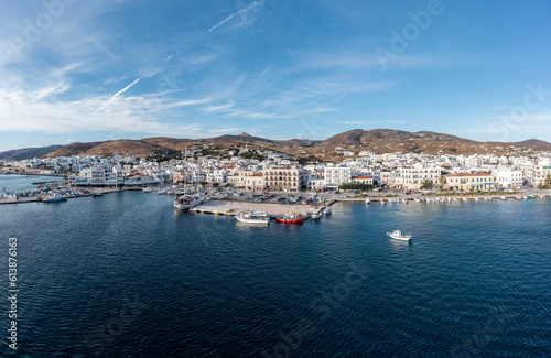 Fototapeta Naklejka Na Ścianę i Meble -  Tinos island Hora town Greece Cyclades. Aerial drone view of port Aegean sea, summer vacation.