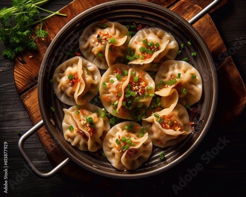  Traditional japaneese gyoza dumplings with chopped green onions and sesame seeds in ceramic plate on wooden table. Top view. AI generated photo