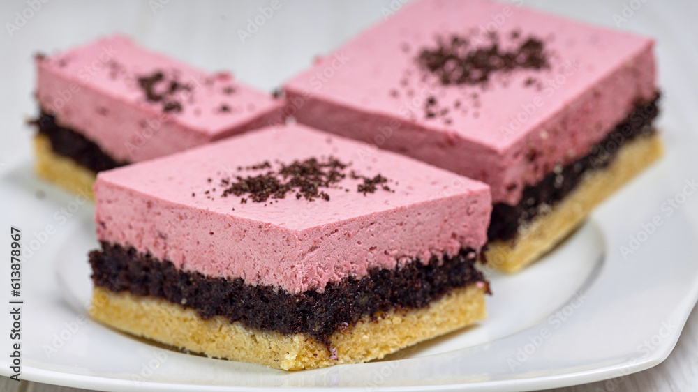 A piece of strawberry and poppy seed cake
