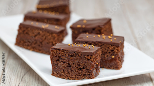 Chocolate brownies on wooden table, homemade bakery and dessert
