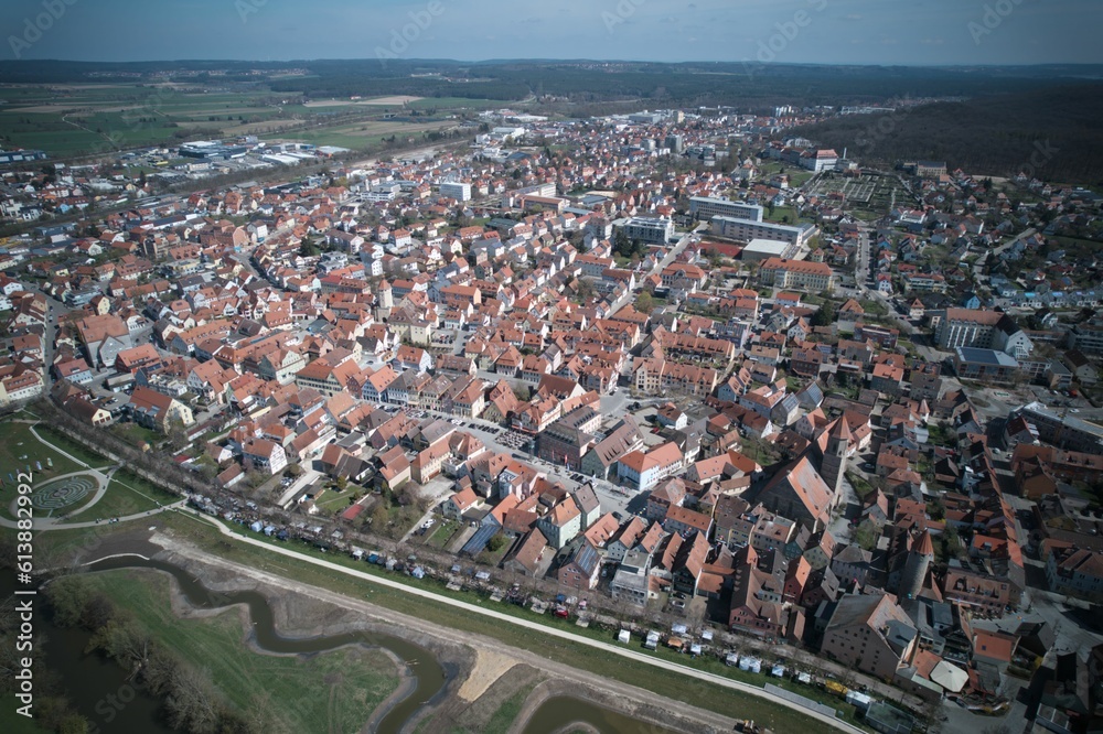 Aerial around the old town Gunzenhausen in Germany on a sunny day in spring	
