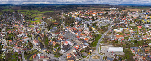 Aerial around the old town Tachov in Czechia on a sunny day in spring