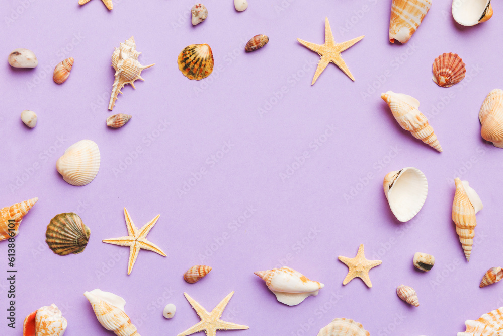 Summer time concept Flat lay composition with beautiful starfish and sea shells on colored table, top view with copy space for text Summer time concept Flat lay composition with beautiful starfish and sea shells on colored table, top view with copy space for text