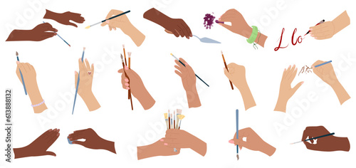 Hands Holding Paintbrushes Set