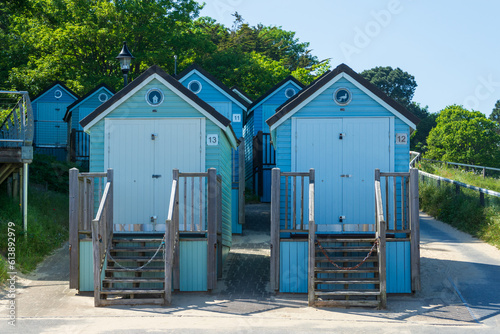 Colourful beach huts Alum Chine Beach in Bournemouth, UK.