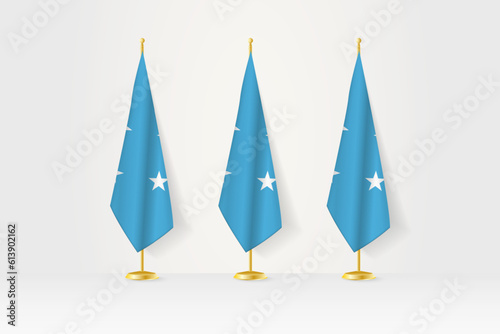 Three Micronesia flags in a row on a golden stand, illustration of press conference and other meetings.