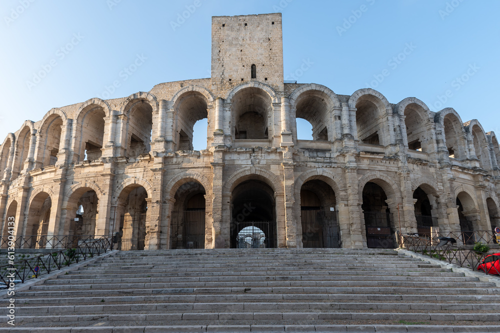 View on old Roman Arena in ancient french town Arles, touristic destination with Roman ruines, Bouches-du-Rhone, France