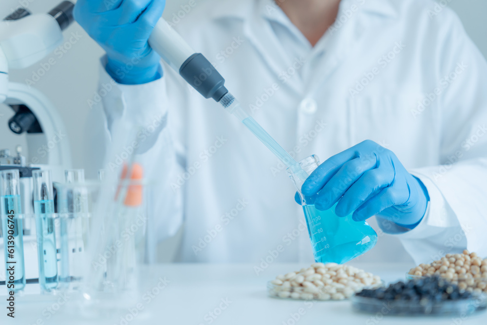Scientist check chemical whole grains residues in laboratory. Control experts inspect the concentration of chemical residues. hazards, standard, prohibited substances, contaminate, Microbiologist. Scientist check chemical whole grains residues in laboratory. Control experts inspect the concentration of chemical residues. hazards, standard, prohibited substances, contaminate, Microbiologist.