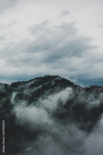 Beautiful view of mountains in the fog - scenic view of Shimla hills on a rainy day - Shimla hill station © Abhinav Joshi