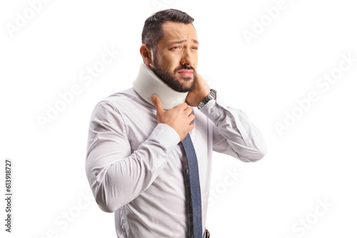 Injured man in pain with a cervical collar holding his neck