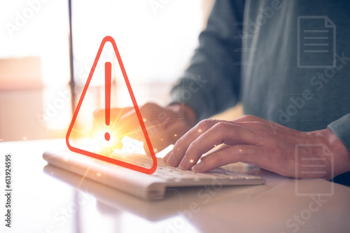 Canvas Print internet network security concept, man typing on keyboard with triangle warning