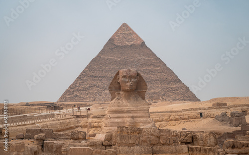 Panoramic view of the Sphinx with the Great Pyramid of Cheops in the background.