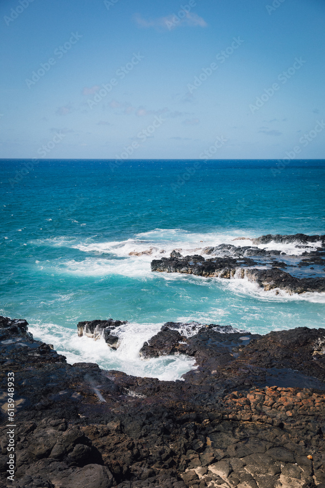 Looking out over Spouting Horn on Poipu Beach on the island of Kauai, Hawaii on a bright, sunny day Looking out over Spouting Horn on Poipu Beach on the island of Kauai, Hawaii on a bright, sunny day
