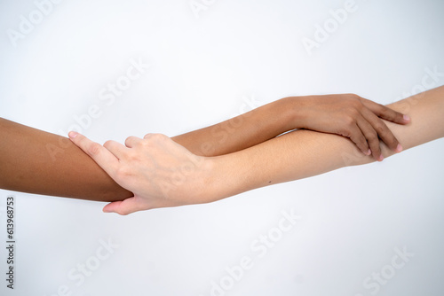 Two Hands Holding with Different Skin Type Close Up