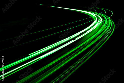 green car lights at night. long exposure