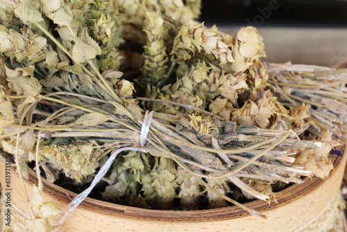 healthy food tea from dried flowers, leaves and herbs in a wooden container in the markets of Turkey 