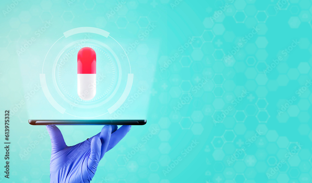 Diet. Nutrition. Healthy nutrition. Vitamin. Online prescription medical concept. Pharmacist. The doctor's hand holds a tablet. A projected pill isolated on green background. Diet. Nutrition. Healthy nutrition. Vitamin. Online prescription medical concept. Pharmacist. The doctor's hand holds a tablet. A projected pill isolated on green background.