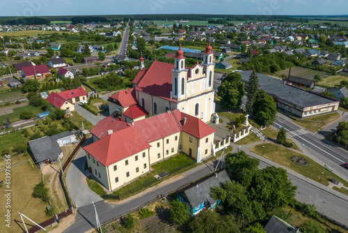 aerial view on neo gothic or baroque temple or catholic church in countryside photo