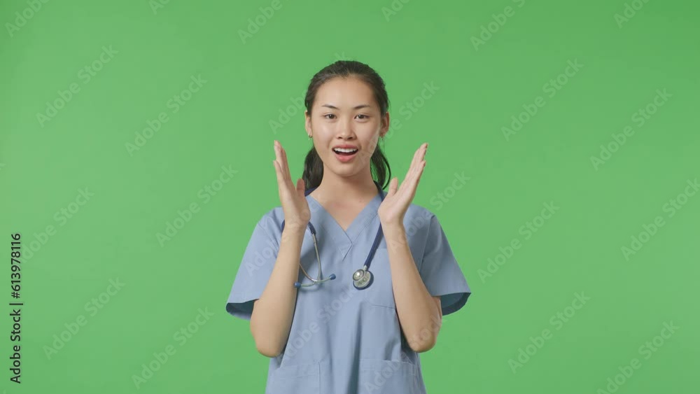 Asian Female Doctor With Stethoscope Showing Gesture Hands Palm, Saying Wow And Smiling On Green Screen Background In The Hospital
Asian Female Doctor With Stethoscope Showing Gesture Hands Palm, Saying Wow And Smiling On Green Screen Background In The Hospital