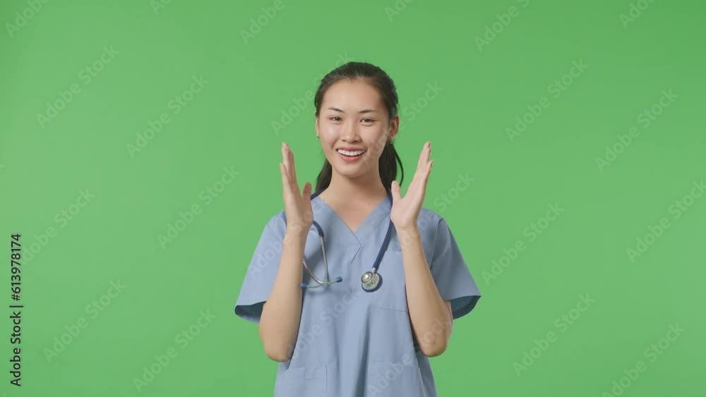 Asian Female Doctor With Stethoscope Showing Gesture Hands Palm, Saying Wow And Smiling On Green Screen Background In The Hospital
Asian Female Doctor With Stethoscope Showing Gesture Hands Palm, Saying Wow And Smiling On Green Screen Background In The Hospital