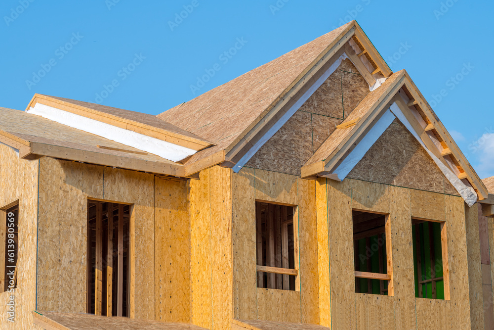 new plywood house under construction frame plank window wall framework roofing plank