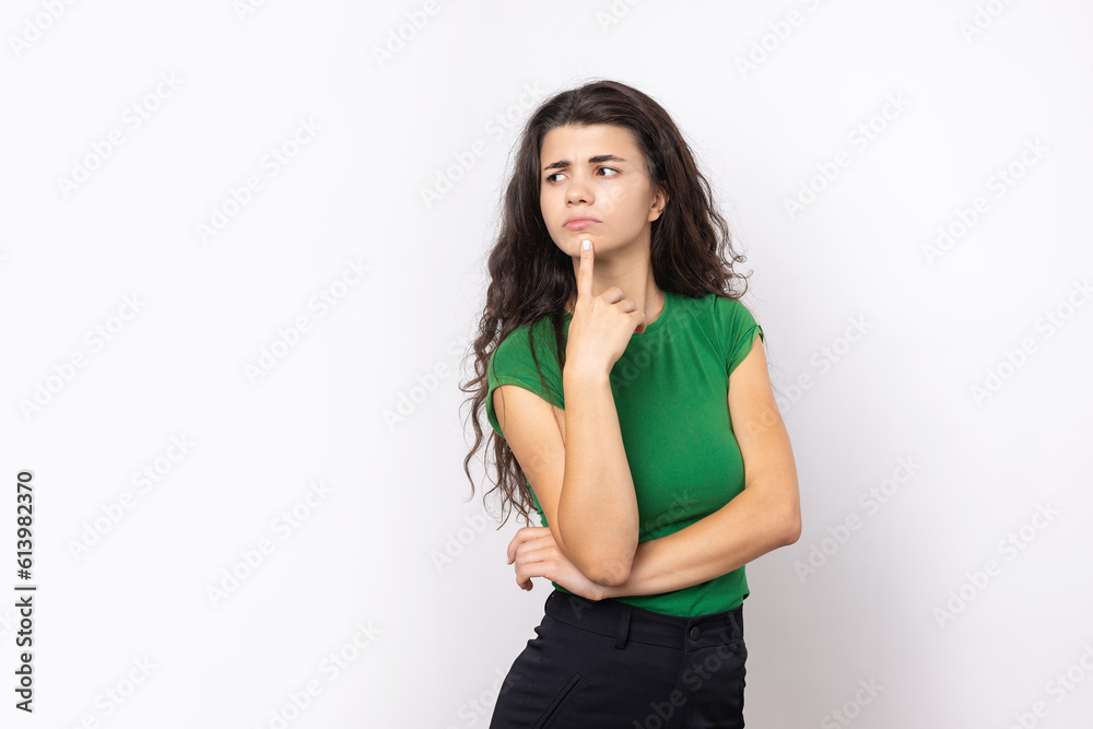 Portrait of a beautiful young woman thinking, isolated on white background Portrait of a beautiful young woman thinking, isolated on white background