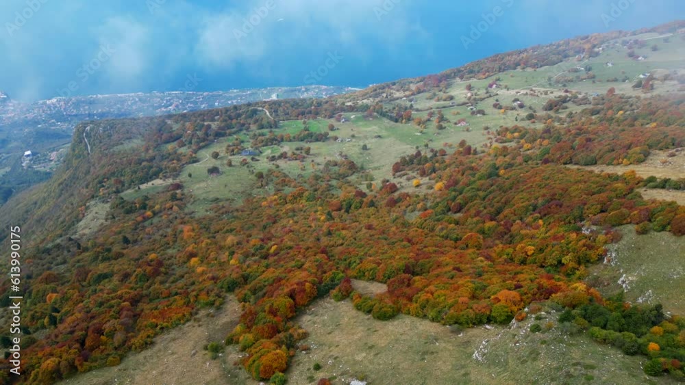 aerial video view of lake Garda and clouds on Monte Baldo mountains in Italy
