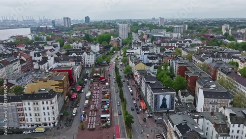 Drone shot of Reeperbahn (die sündigste Meile and Kiez).The Reeperbahn is a street and entertainment district in Hamburg's St. Pauli district, one of the two centres of Hamburg's nightlife . photo