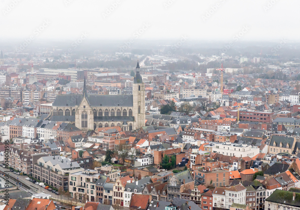 Southward View over misty Mechelen - View over the beautiful medieval city of Mechelen a seen from the top of the Sint-Romboutskathedraal. The Church in the centre of the picture is the mechelen Onze-