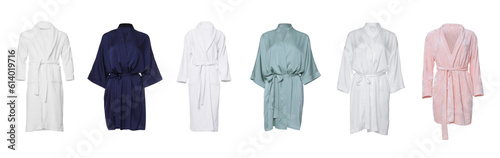 Set of different bathrobes on white background