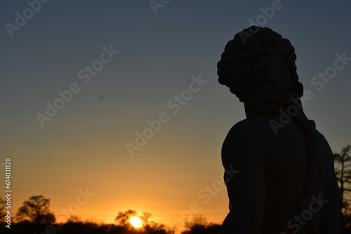 Silhouette of Statue in Sunset