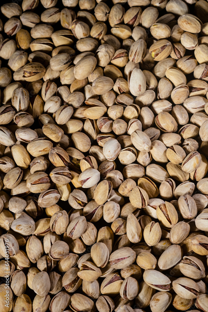 Pistachios background. Pistachio nuts close up. Pistachios background. Pistachio nuts close up.