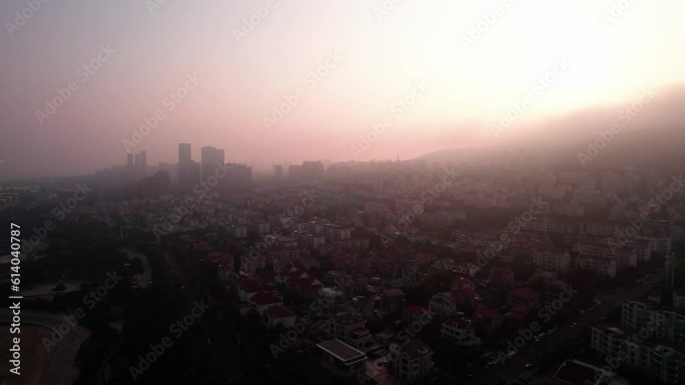 4k aerial photography of Qingdao coastline in advection fog at sunset 4k aerial photography of Qingdao coastline in advection fog at sunset