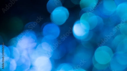 Abstract bokeh lights with blue blurred light background