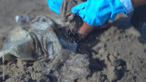 he pik the garbage in juhu beach closeup view in mumbai photo